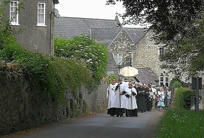 Corpus Christi procession along road